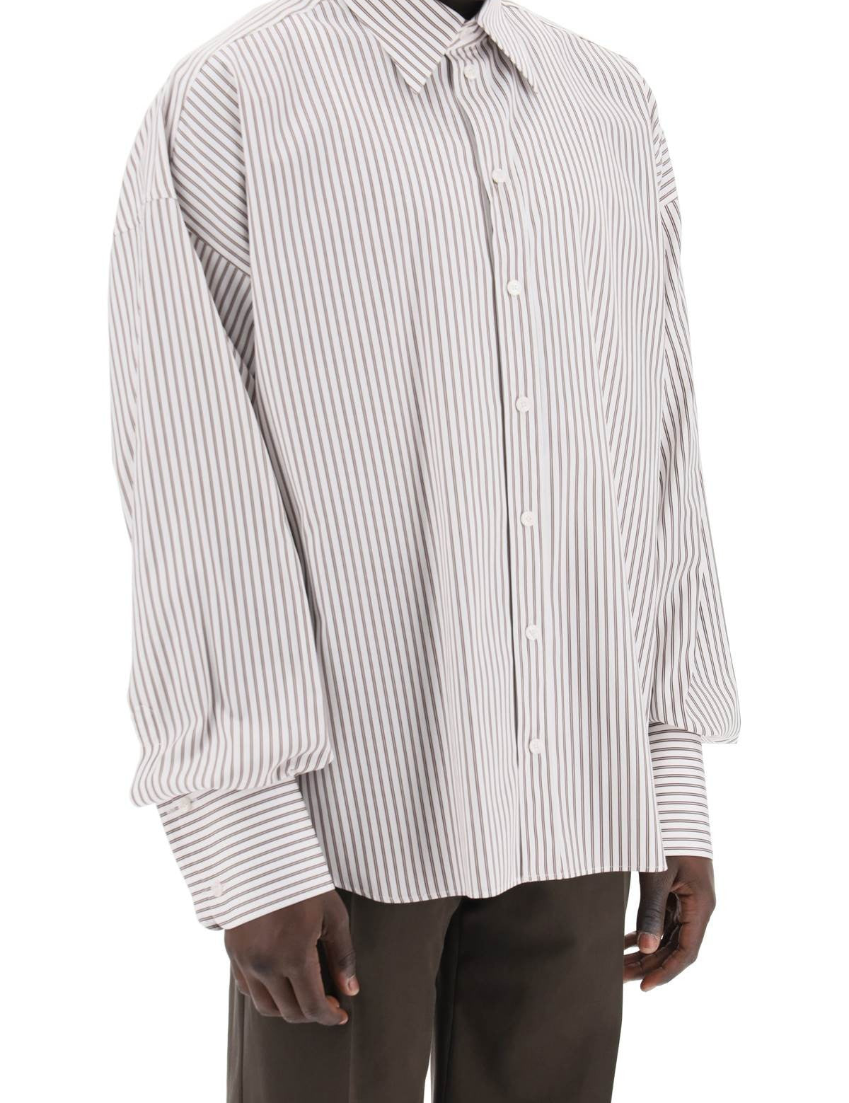 dolce-gabbana-oversized-striped-poplin-shirt_0c1f76fe-03c3-4c88-90ad-959d90edd931.jpg