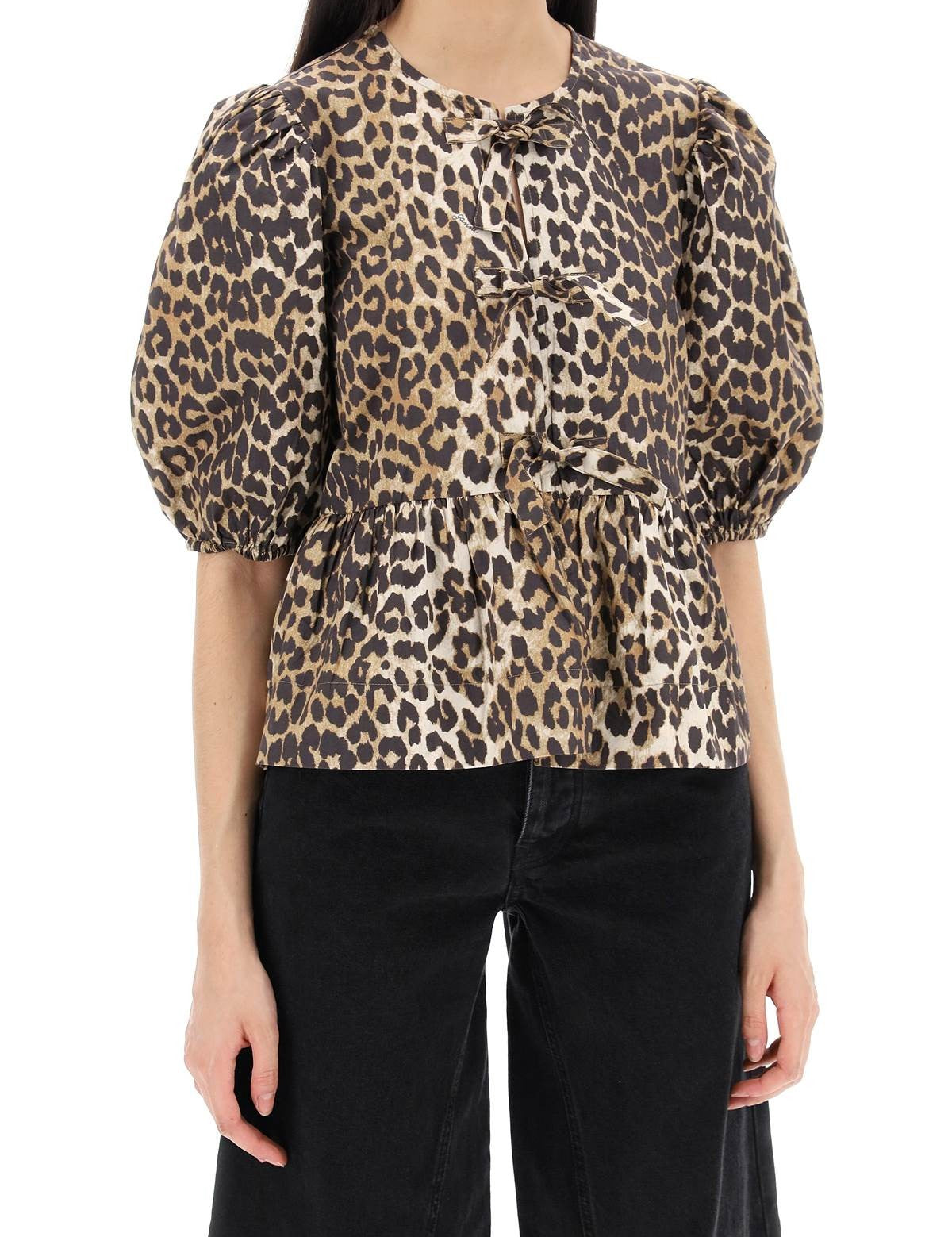 ganni-leopard-print-peplum-blouse_b4d053e0-796d-41c8-989a-ab8f15a50f43.jpg