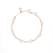 Doppia - Gold Double Chain Bracelet with Akoya Pearls.