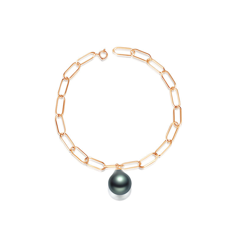 Notte Luna - gold chain and Tahitian pearl bracelet.