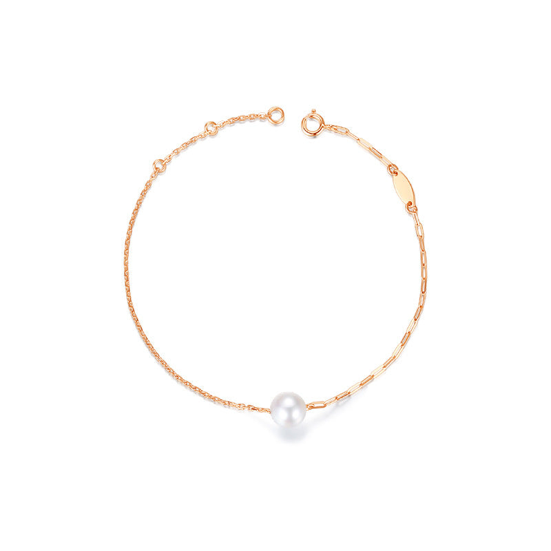Luna Blanco - gold chain and akoya pearl bracelet.